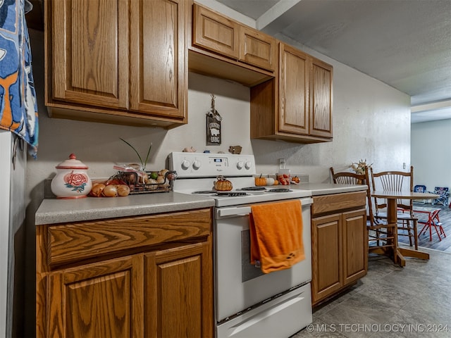 kitchen featuring white electric range