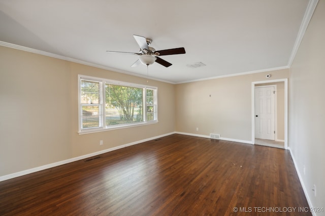 unfurnished room with crown molding, ceiling fan, and dark wood-type flooring