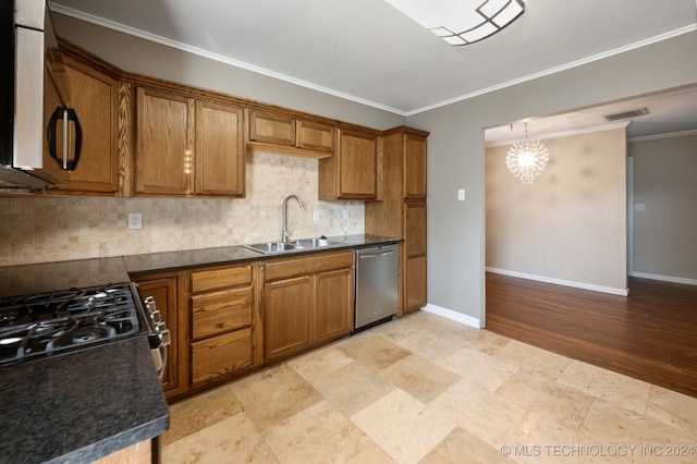 kitchen featuring tasteful backsplash, sink, crown molding, light hardwood / wood-style flooring, and appliances with stainless steel finishes