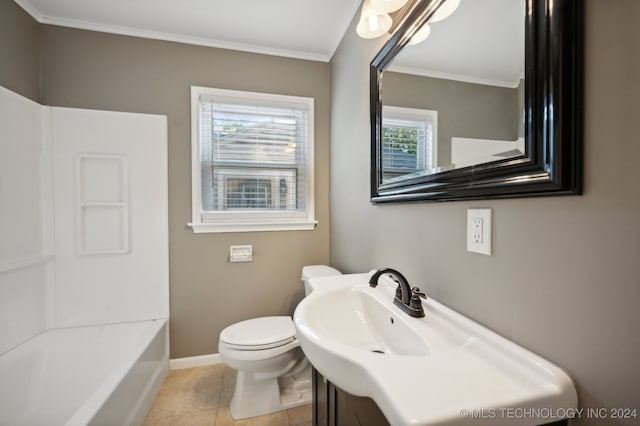 bathroom with vanity, plenty of natural light, toilet, and tile patterned flooring