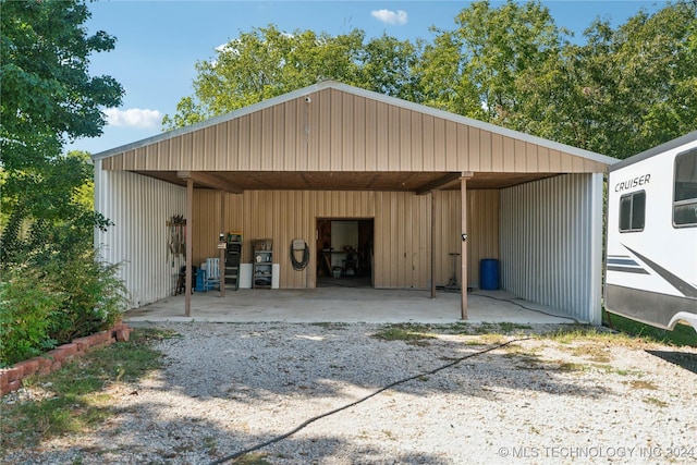 exterior space featuring a carport