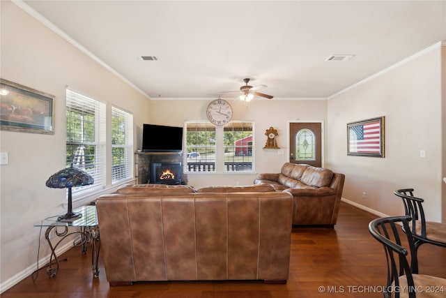 living room with ceiling fan, dark hardwood / wood-style flooring, and ornamental molding