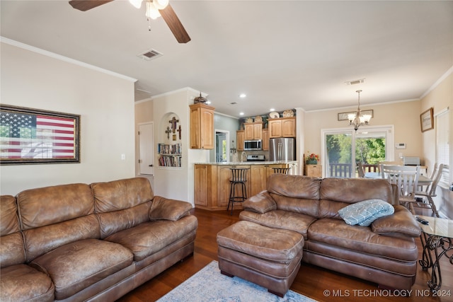 living room with dark hardwood / wood-style floors, ornamental molding, and ceiling fan with notable chandelier