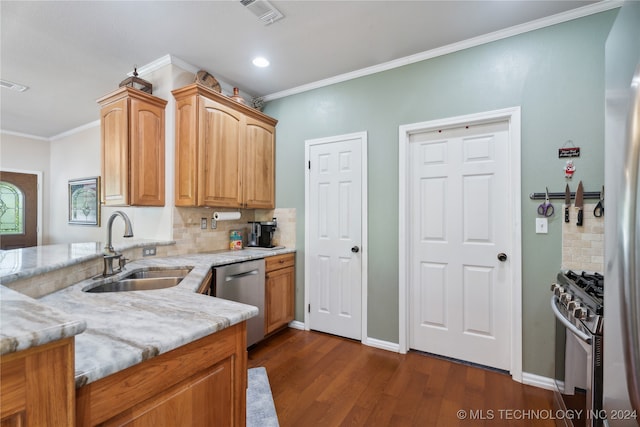 kitchen with decorative backsplash, light stone counters, stainless steel appliances, sink, and dark hardwood / wood-style floors