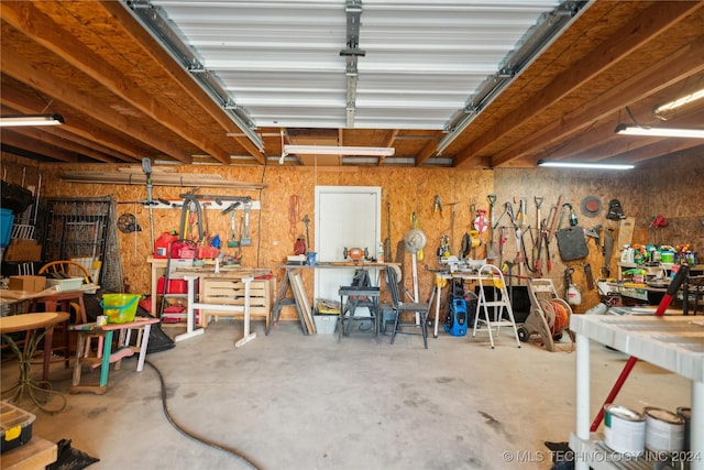 garage with a workshop area