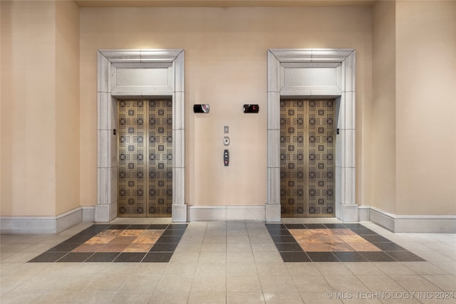 interior space with tile patterned floors