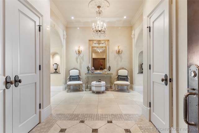 corridor with a chandelier, crown molding, and light tile patterned floors