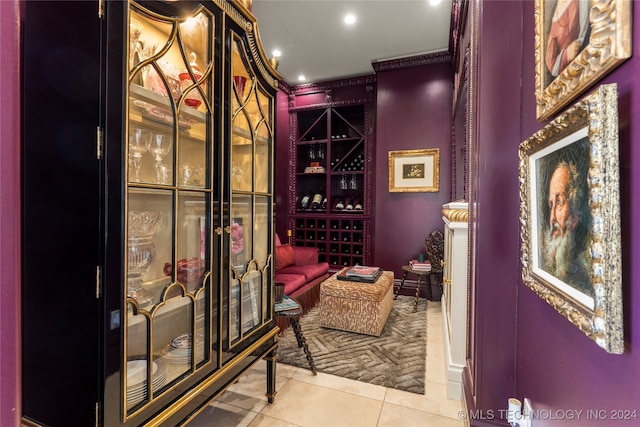 wine room with light tile patterned floors