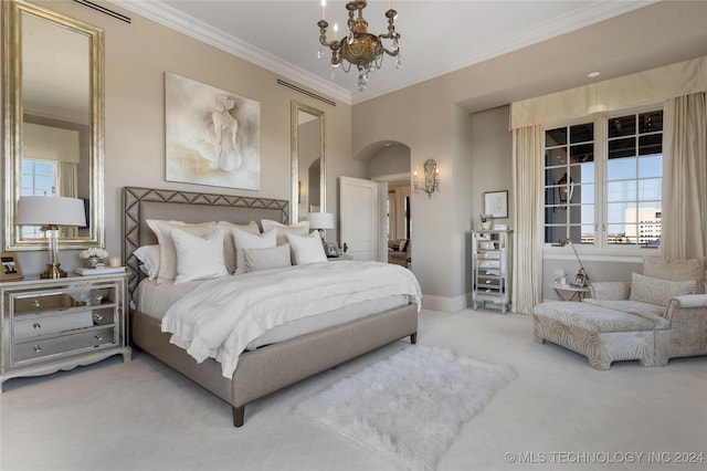 carpeted bedroom with crown molding and a chandelier