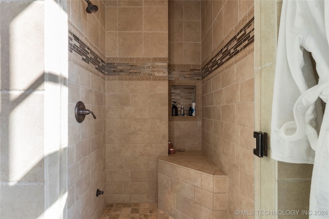 bathroom with an enclosed shower