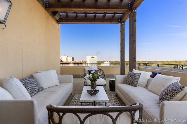 view of patio / terrace featuring a pergola and outdoor lounge area