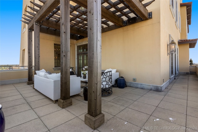 view of patio featuring a pergola