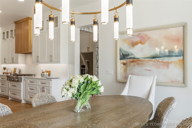 dining room with light hardwood / wood-style floors