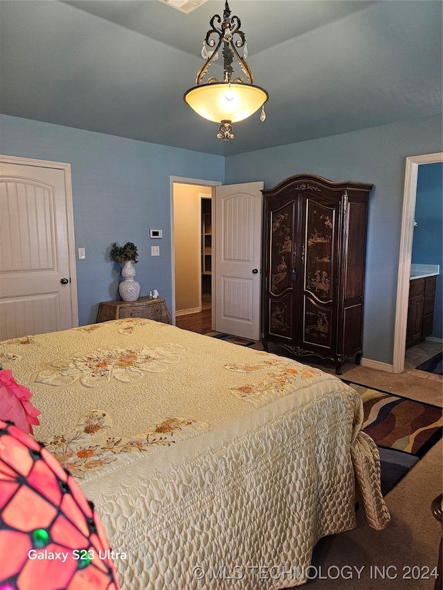 bedroom featuring ensuite bathroom