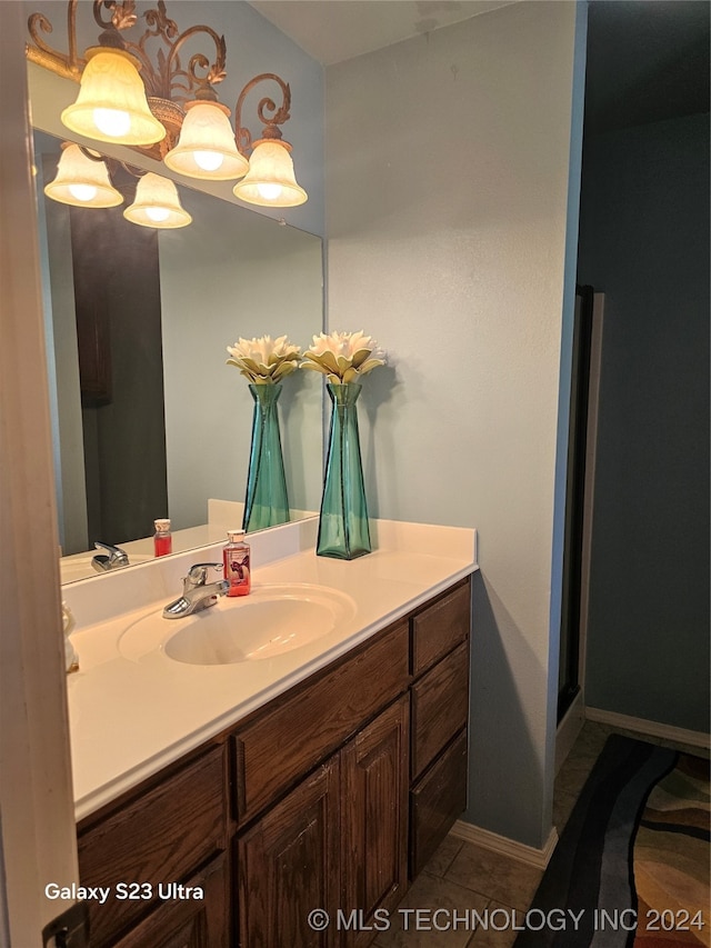 bathroom featuring vanity and tile patterned floors