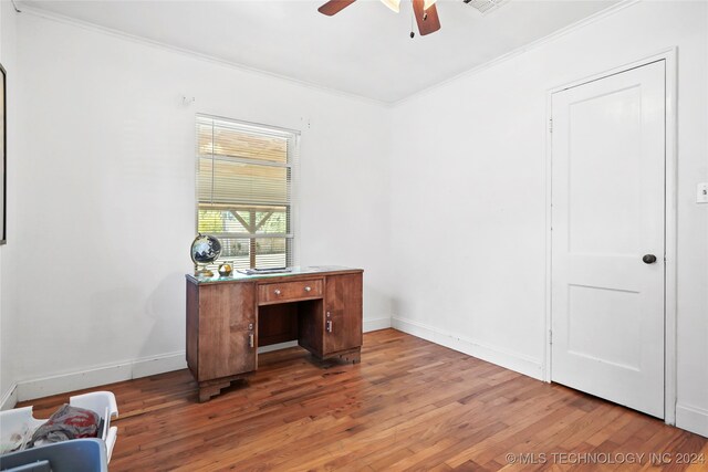 office area with wood-type flooring, crown molding, and ceiling fan