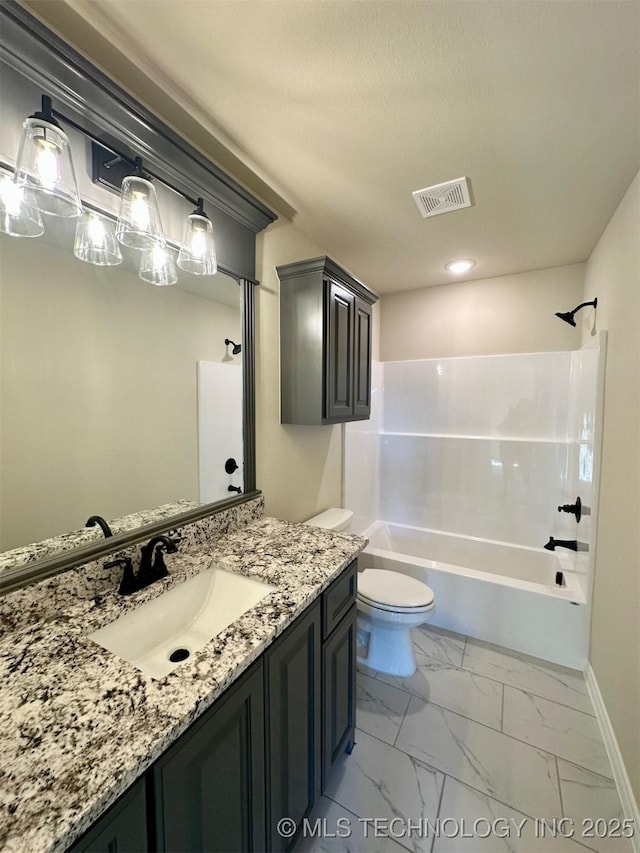 full bathroom featuring vanity,  shower combination, and toilet