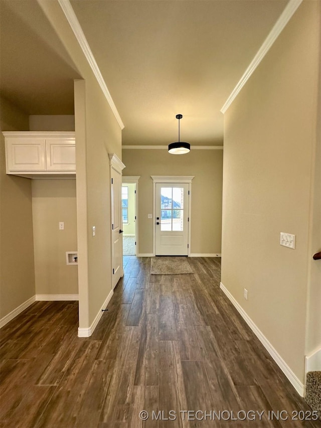 interior space with crown molding and dark hardwood / wood-style floors