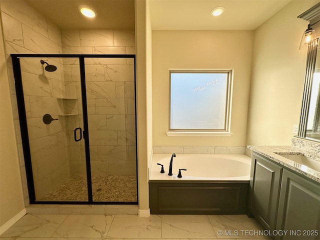 bathroom featuring vanity and plus walk in shower