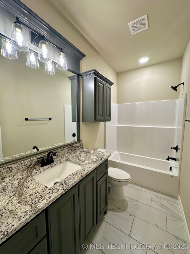 full bathroom with vanity, shower / washtub combination, and toilet