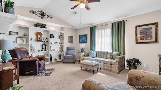 carpeted living room with lofted ceiling and ceiling fan