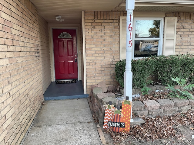 doorway to property with a porch