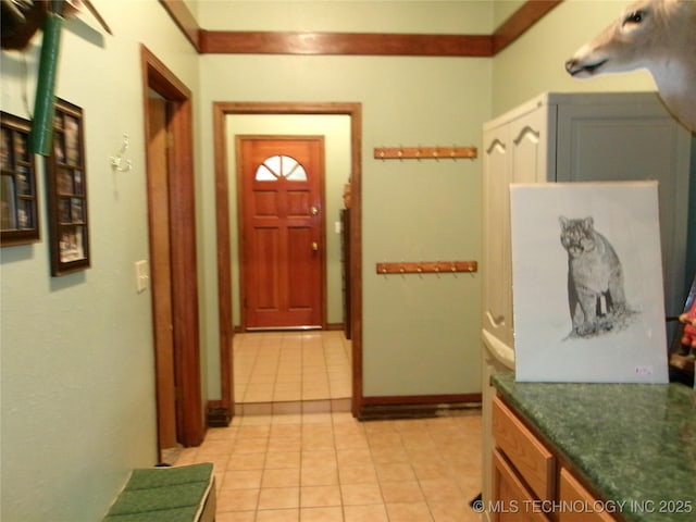 corridor with light tile patterned flooring