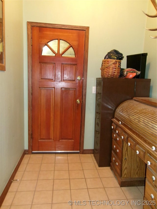 view of tiled entrance foyer