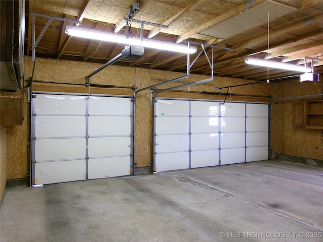 garage featuring a garage door opener