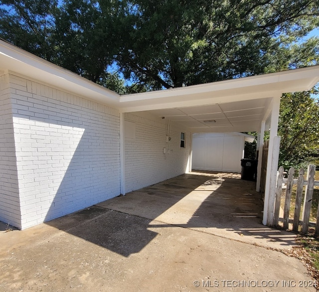 view of parking with a carport