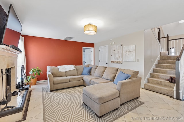 living room with light tile patterned floors