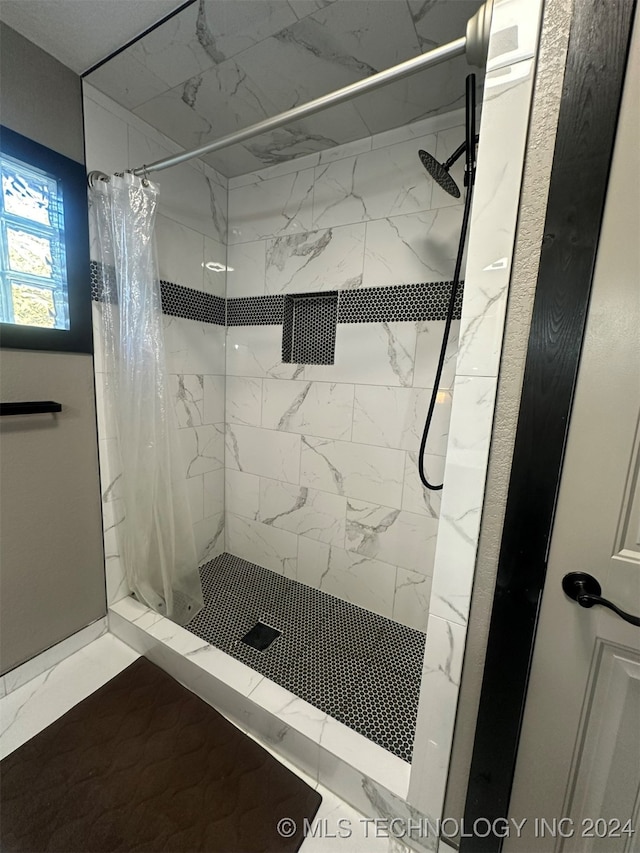 bathroom with a shower with curtain