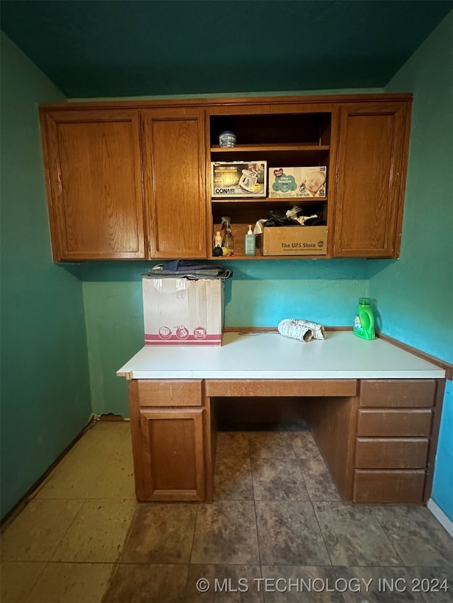 kitchen featuring built in desk