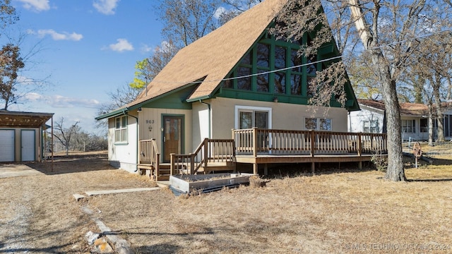 view of front facade featuring a wooden deck