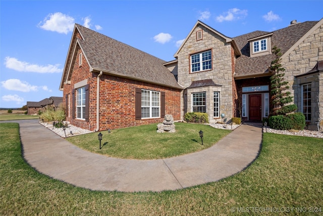 view of front of house with a front lawn