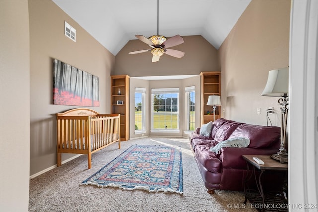 interior space with ceiling fan, lofted ceiling, and carpet