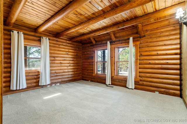 carpeted spare room featuring wood ceiling, beam ceiling, log walls, and a wealth of natural light