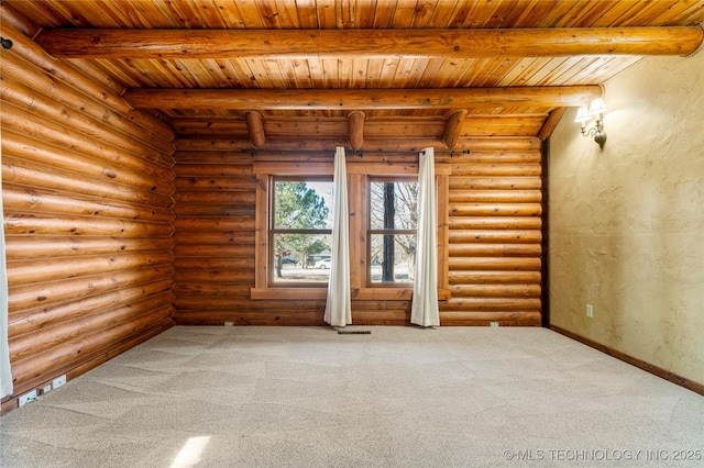 carpeted spare room featuring log walls, beam ceiling, and wooden ceiling