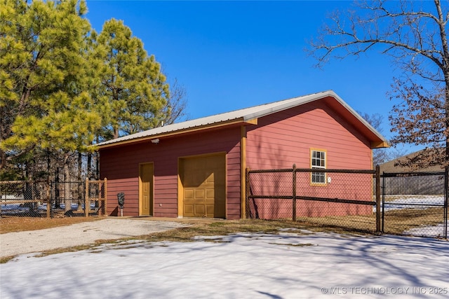 view of outbuilding featuring a garage