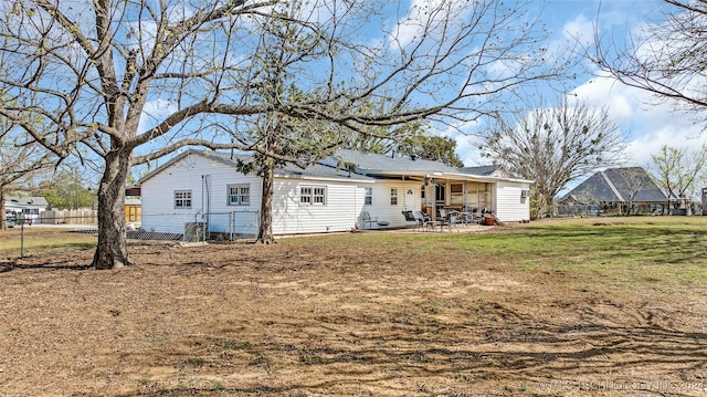 back of property featuring a patio area