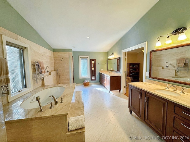 bathroom with vanity, separate shower and tub, lofted ceiling, and tile patterned flooring