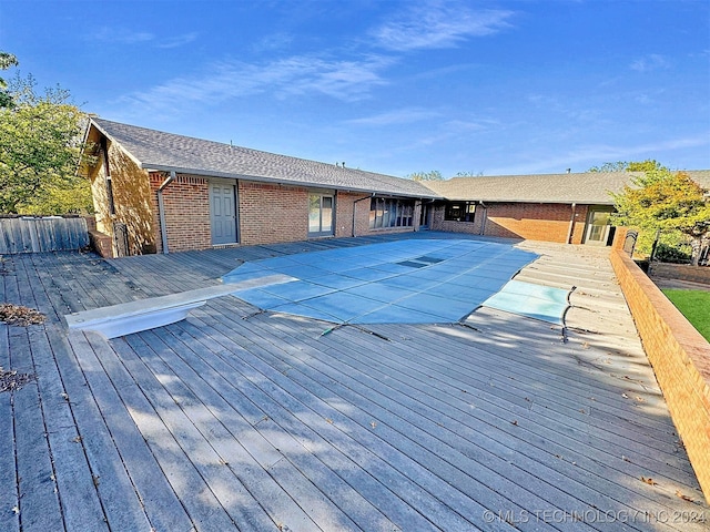 view of pool featuring a wooden deck