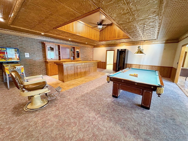 rec room featuring crown molding, pool table, light colored carpet, and wooden walls