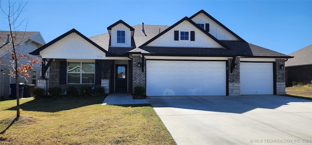 view of front of home featuring roof with shingles, driveway, brick siding, and a front lawn