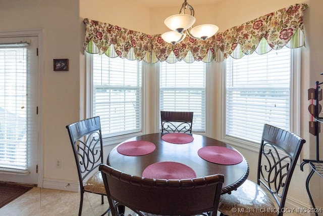 dining room featuring light tile patterned flooring