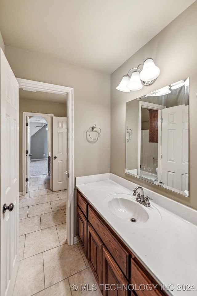 bathroom featuring vanity and tile patterned flooring