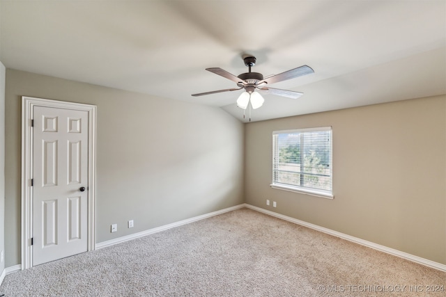 carpeted empty room with ceiling fan