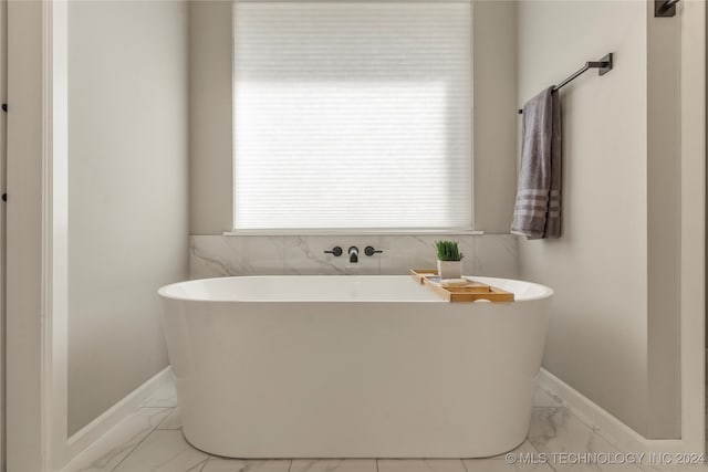 bathroom with a bathtub