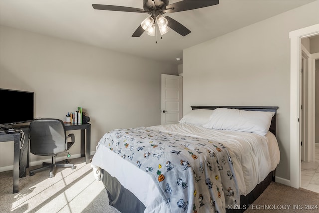 bedroom with light carpet and ceiling fan