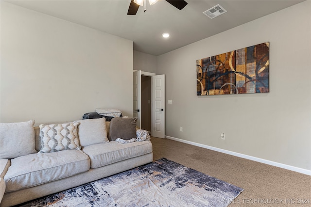 living room with carpet and ceiling fan